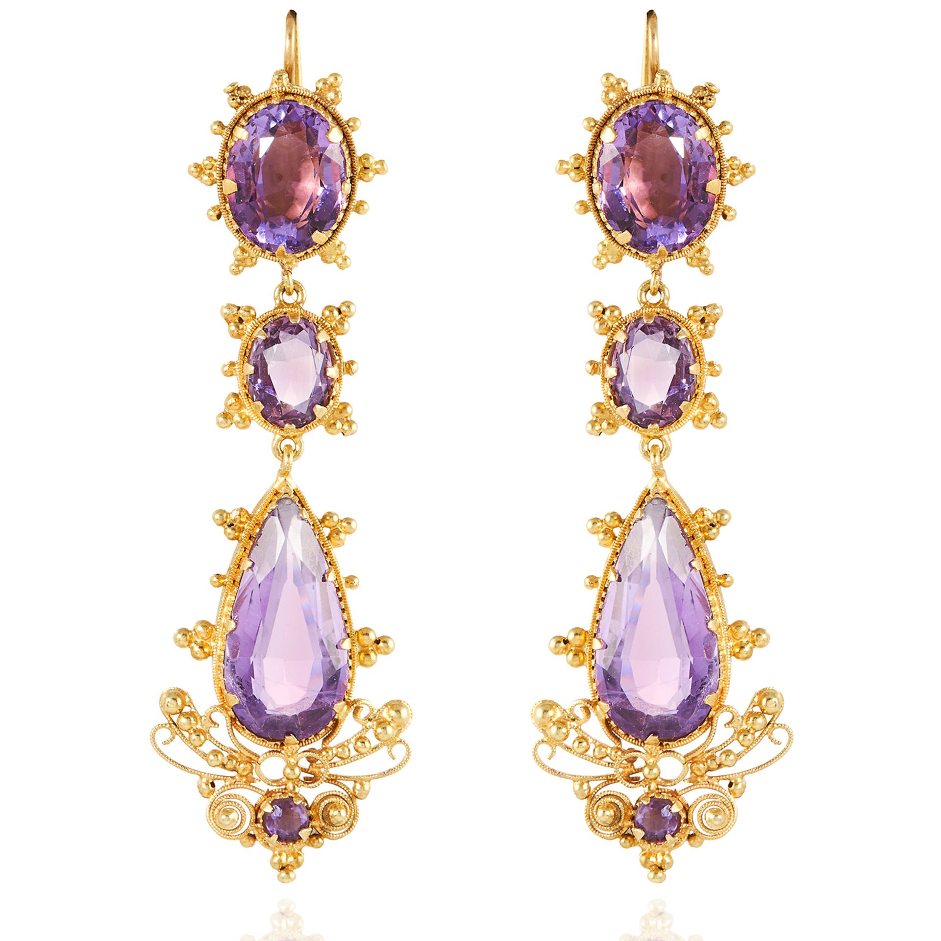 A PAIR OF ANTIQUE AMETHYST EARRINGS in high carat yellow gold, each comprising of two oval cut