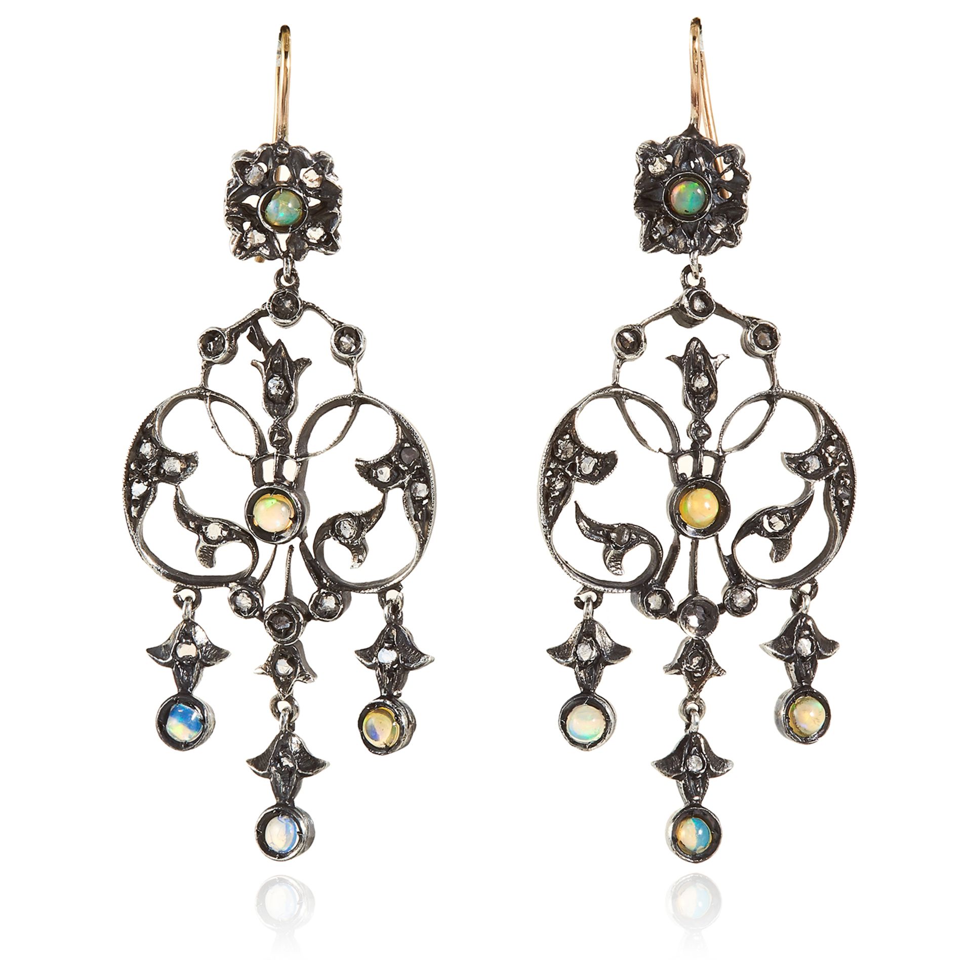 A PAIR OF OPAL AND DIAMOND EARRINGS in gold and silver, the openwork scrolling design set with opals