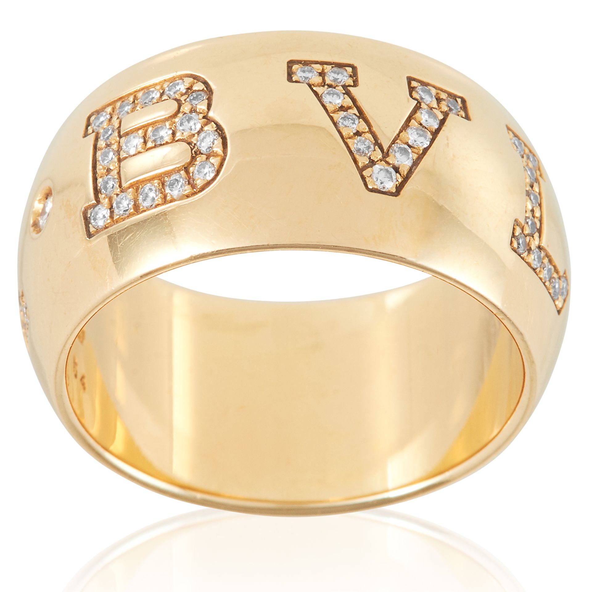 A DIAMONG MONOLOGO RING, BULGARI in 18ct yellow gold, the bevelled band signed BVLGARI, jewelled