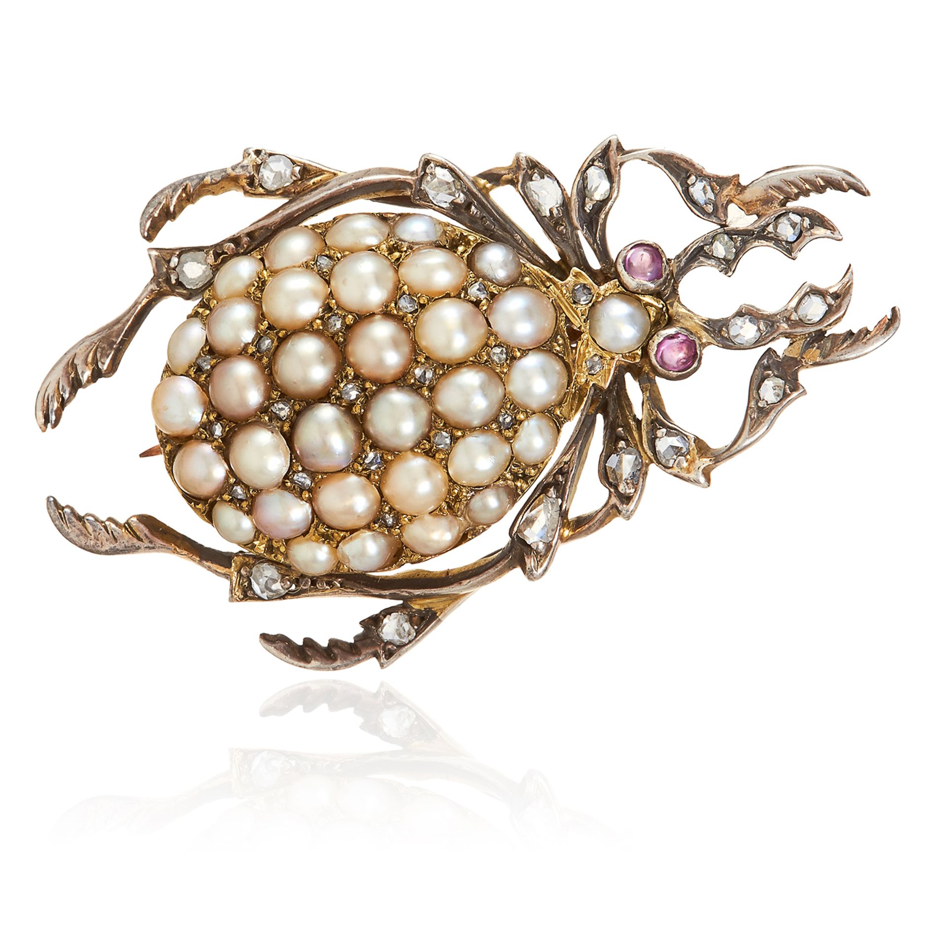 AN ANTIQUE PEARL, DIAMOND AND RUBY SCARAB MOURNING BROOCH in high carat yellow gold, depicting a