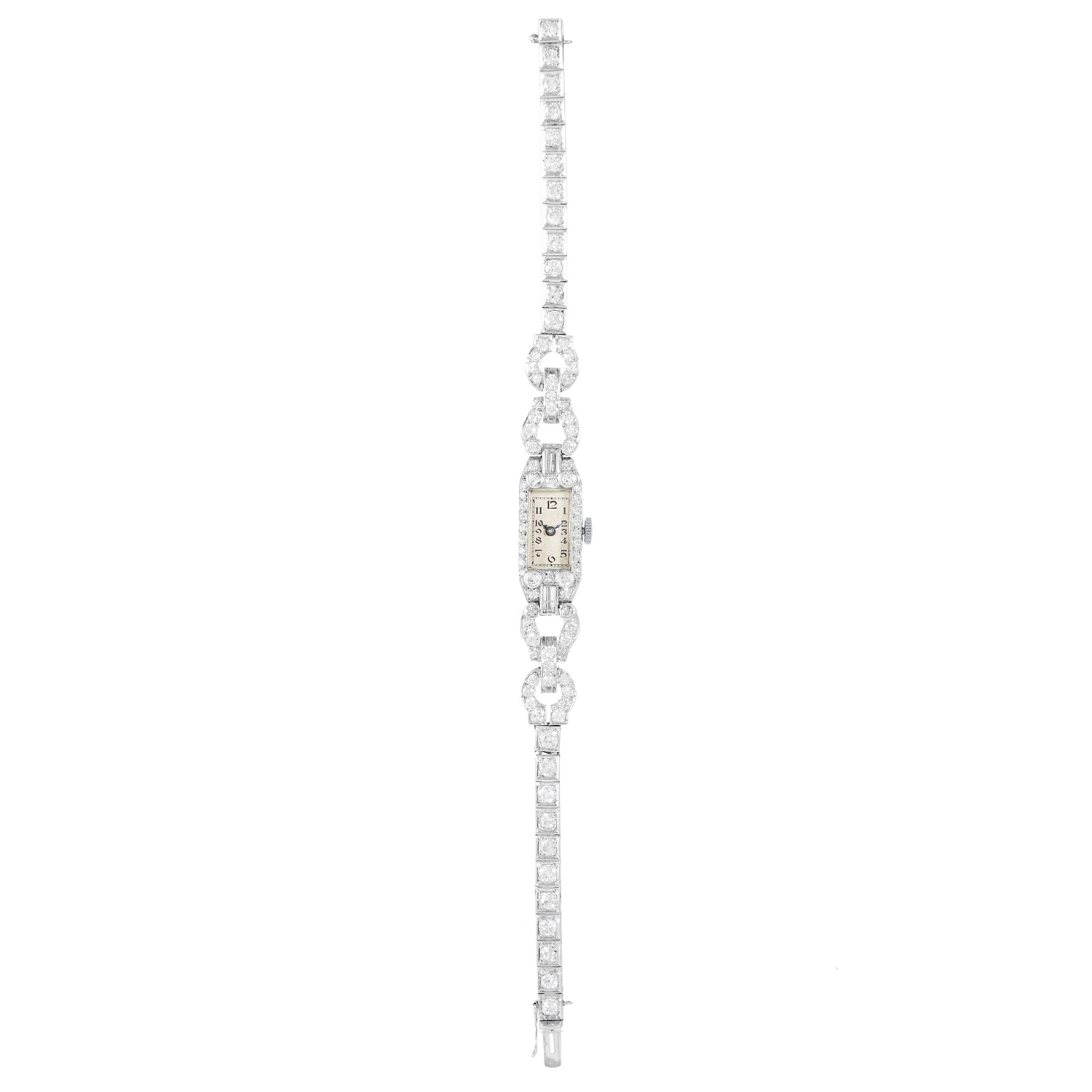 AN ART DECO DIAMOND COCKTAIL WATCH in white gold or platinum, set with round, baguette and single