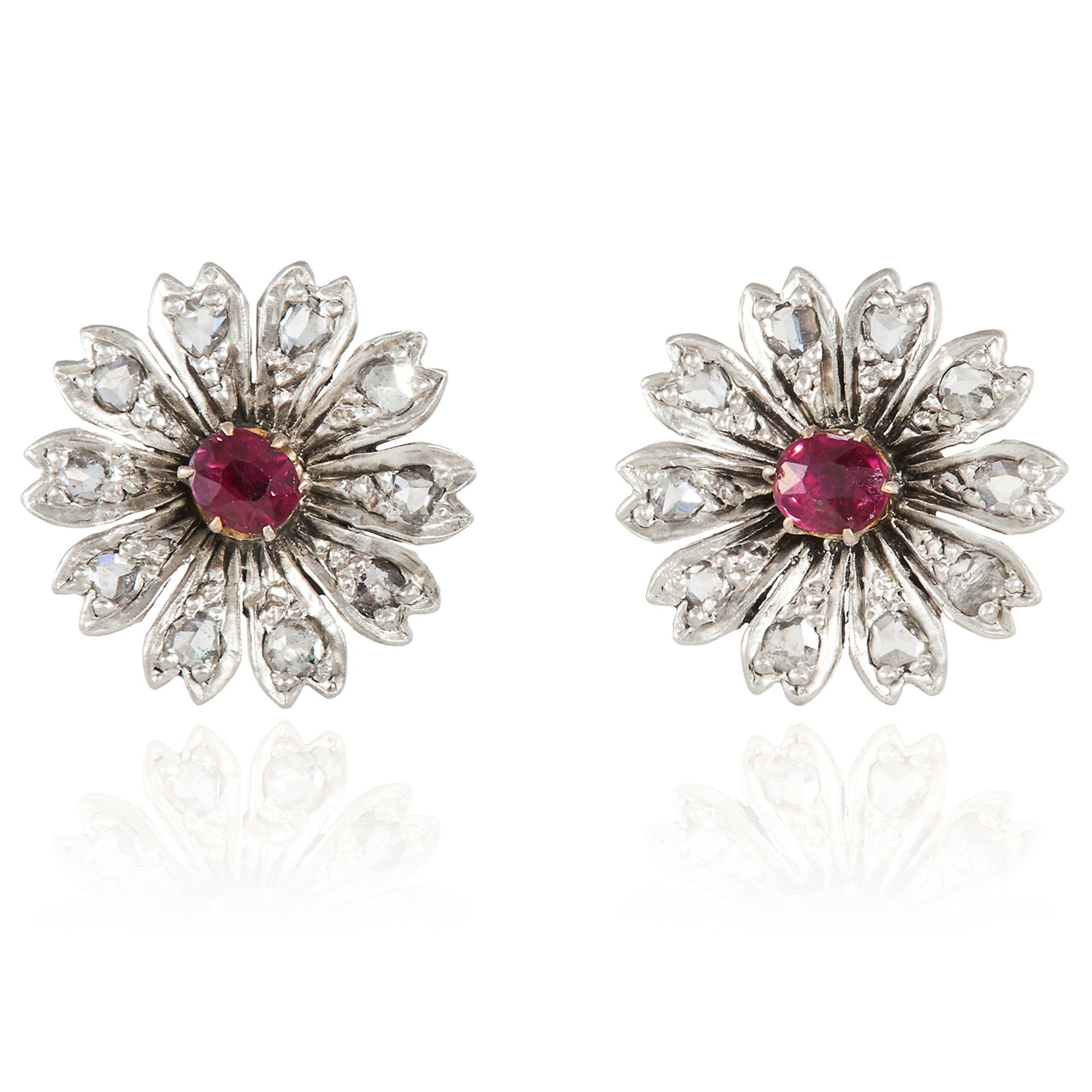 A PAIR OF RUBY AND DIAMOND EARRINGS in yellow gold, in floral design, set with an old cut ruby and