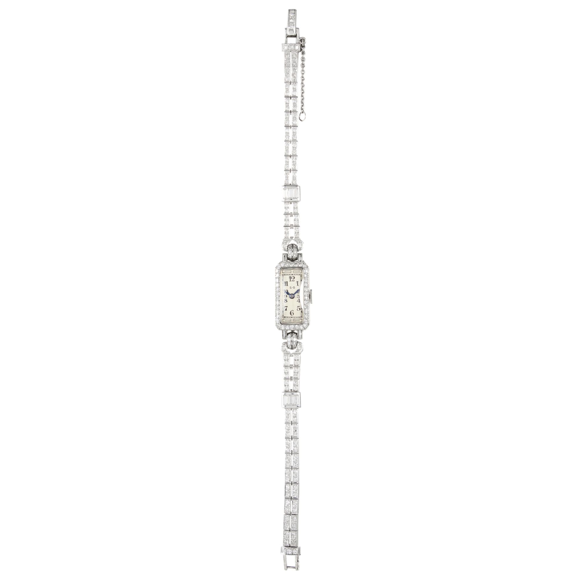 AN ART DECO DIAMOND COCKTAIL WATCH, PATEK PHILIPPE MOVEMENT in white gold or platinum, the strap