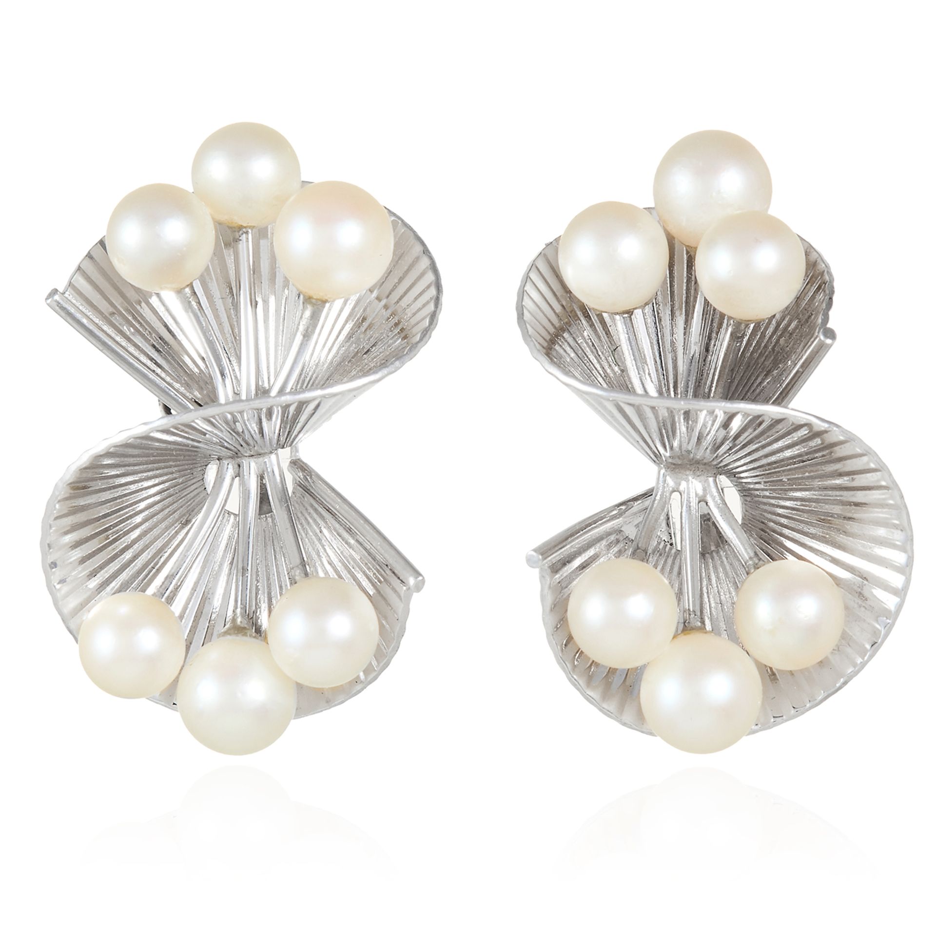 A PAIR OF PEARL CLIP EARRINGS in 14ct white gold, each undulating s-motif accented by trios of