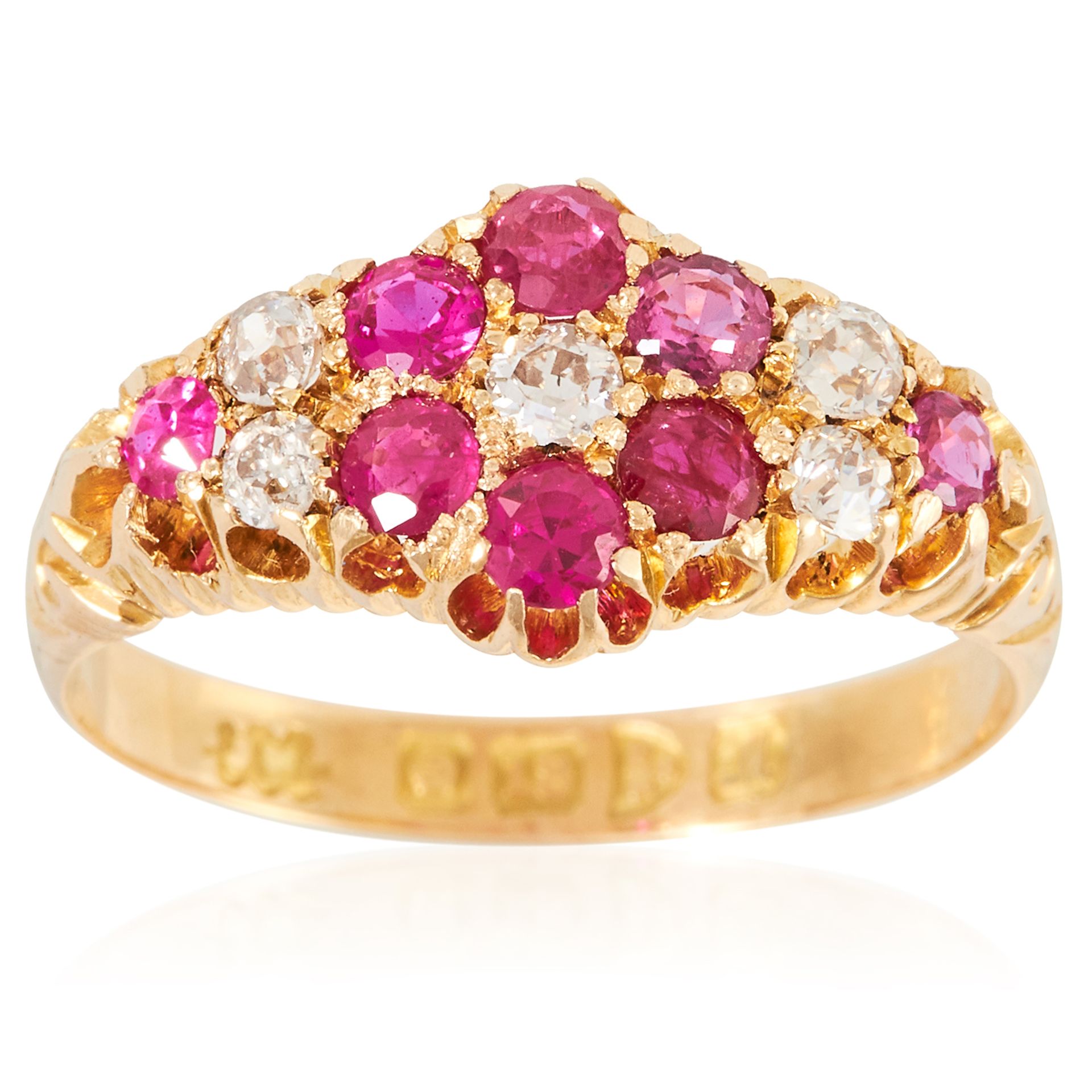 AN ANTIQUE RUBY AND DIAMOND RING, EARLY 20TH CENTURY in 18ct yellow gold, the floral motifs relieved