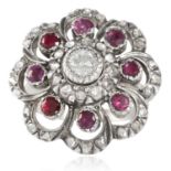 AN ANTIQUE DIAMOND AND RUBY RING, DUTCH 19TH CENTURY in yellow gold and silver, concentric rows of