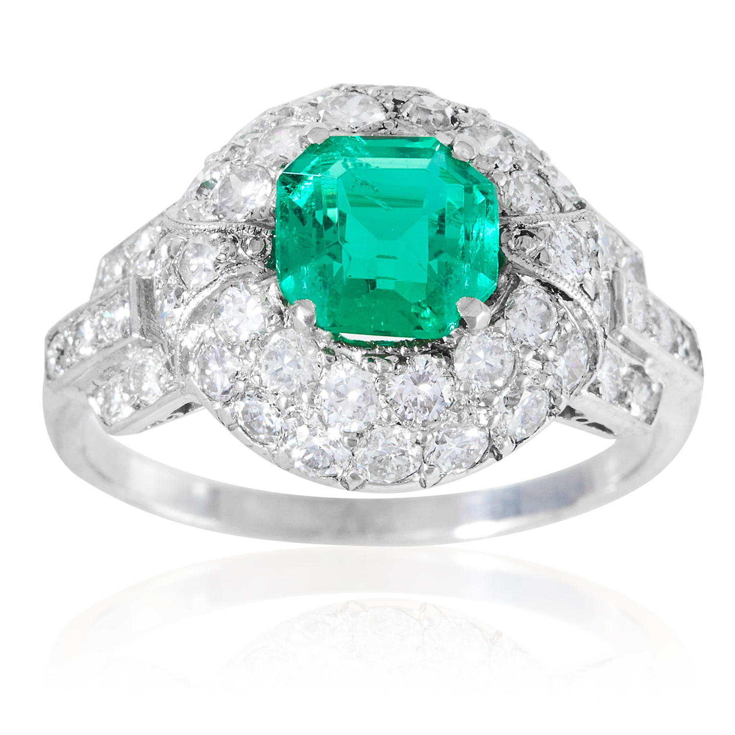 A COLOMBIAN 1.05 CARAT EMERALD AND DIAMOND DRESS RING in white gold or platinum, set with a square