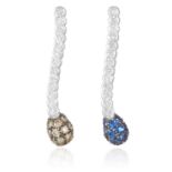 A PAIR OF SAPPHIRE AND DIAMOND PENDANTS in 18ct white gold, each undulating body jewelled with