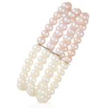 A PINK AND WHITE PEARL BRACELET comprising three rows of white and pink round pearls, unmarked, 36.