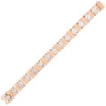 A DIAMOND FANCY LINK BRACELET in 18ct gold, set with alternating rose and white gold links, set with