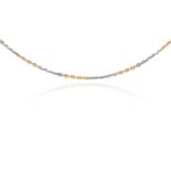 A GOLD WATCH CHAIN in 18ct yellow and white gold, stamped 18ct, 33.0cm, 9.3g.