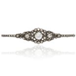 AN ANTIQUE DIAMOND BAR BROOCH, DUTCH 19TH CENTURY in yellow gold and silver, the central rose cut