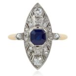 AN ART DECO SAPPHIRE AND DIAMOND RING in 18ct yellow gold and platinum, the marquise face set with a