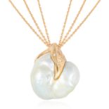 A LARGE BAROQUE PEARL AND DIAMOND PENDANT NECKLACE in 18ct yellow gold, the large baroque pearl