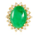 A JADE CLUSTER RING in 18ct yellow gold, set with a polished jade cabochon in a cluster of round cut