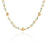 A VINTAGE JADE BEAD NECKLACE, CIRCA 1970 in high carat yellow gold, comprising of twenty-four