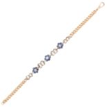 AN ANTIQUE SAPPHIRE AND DIAMOND BRACELET in 14ct yellow gold, comprising of foliate and scrolling