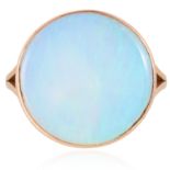 AN OPAL DRESS RING in yellow gold, set with a cabochon opal of approximately 17mm, unmarked, size