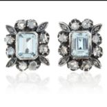 A PAIR OF AQUAMARINE AND DIAMOND EARRINGS in yellow gold and silver, the step cut aquamarines of