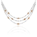 A 10.90 CARAT DIAMOND NECKLACE in 18ct white gold, designed as a trio of rows of white diamond