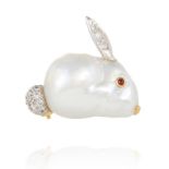A BAROQUE PEARL, RUBY AND DIAMOND BUNNY RABBIT BROOCH, E WOLFE & CO in high carat gold, designed