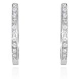 A PAIR OF DIAMOND HOOP EARRINGS in white gold or platinum, jewelled with round cut diamonds