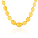 AN AMBER BEAD NECKLACE comprising a single row of thirty five graduated, polished amber beads,