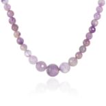 AN AMETHYST BEAD NECKLACE comprising of sixty-two faceted amethyst beads, 44cm, 35.42g.