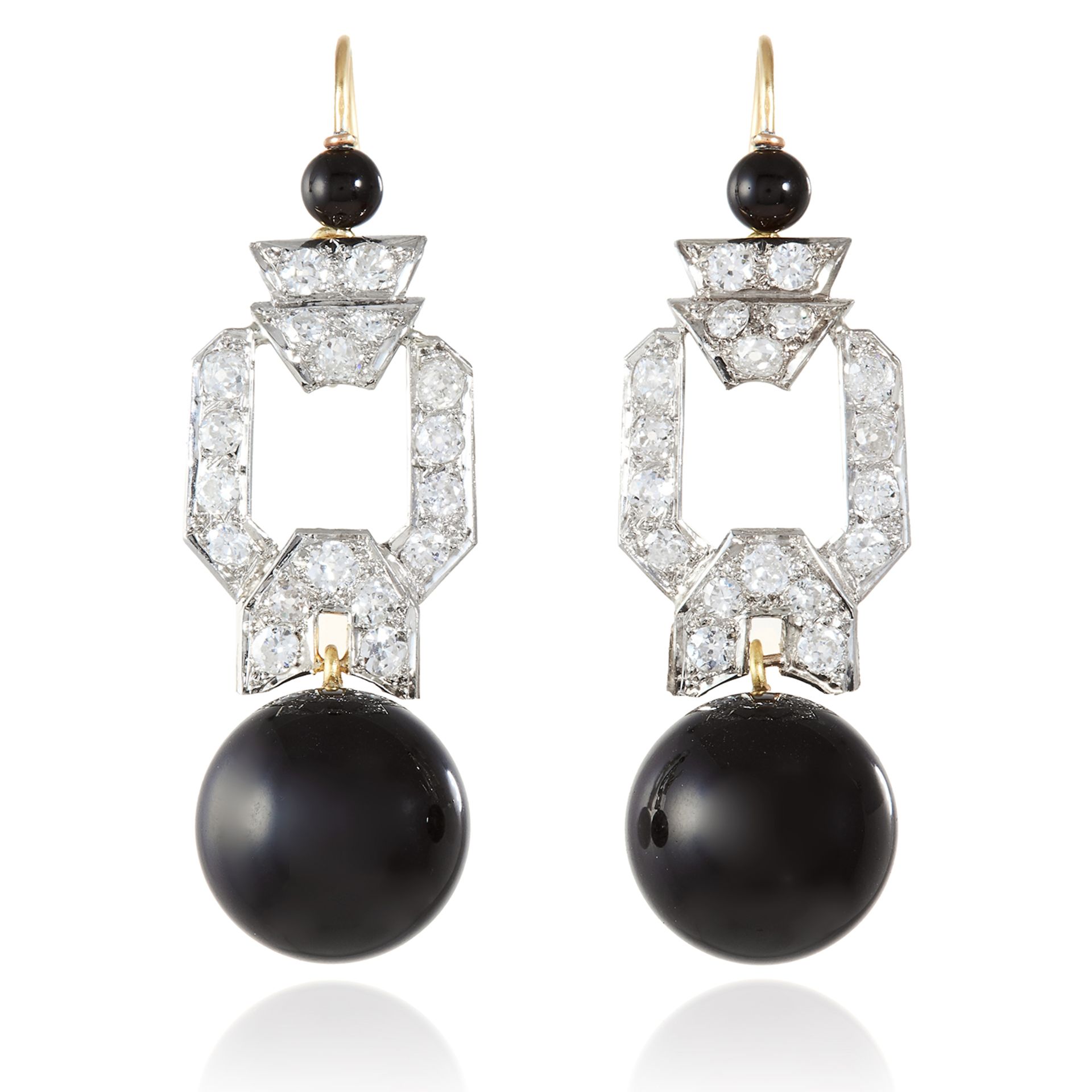 A PAIR OF ART DECO BLACK ONYX AND DIAMOND EARRINGS in platinum and yellow gold, each suspending a