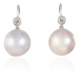 A PAIR OF ANTIQUE PEARL AND DIAMOND EARRINGS in white gold or platinum, each set with a pearl of