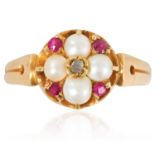 A RUBY, PEARL AND DIAMOND RING in 15ct yellow gold, in cluster form, set with a rose cut diamond,