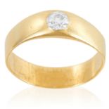 A DIAMOND DRESS RING in yellow gold, set with an old cut diamond of approximately 0.63 carats,