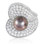 A PEARL AND DIAMOND DRESS RING, SCHOEFFEL in 18ct white gold, of abstract floral design, set with