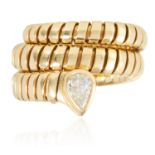 A TUBOGAS DIAMOND RING, BULGARI in 18ct yellow gold, designed as an articulated coil, set at the