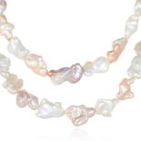 TWO BAROQUE FRESH WATER KESHI PEARL SAUTOIR NECKLACES in 18ct gold, each comprising a single row