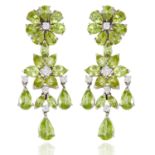 A PAIR OF PERIDOT AND DIAMOND EARRINGS in 18ct white gold, each of chandelier form, set with diamond