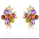 A PAIR OF GEMSET EARRINGS in yellow gold, in floral motif, set with various gems including round cut