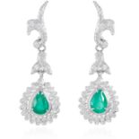 A PAIR OF EMERALD AND DIAMOND DROP EARRINGS, in 18ct white gold, the pear cut emeralds suspended