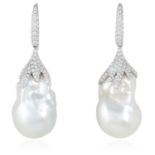 A PAIR OF BAROQUE PEARL AND DIAMOND EARRINGS in 18ct white gold, each set with a large baroque pearl