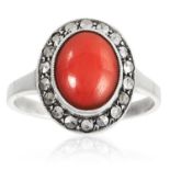 A PAIR OF CORAL AND MARCASITE RINGS in white metal, each set with polished coral and marcasite, 6.