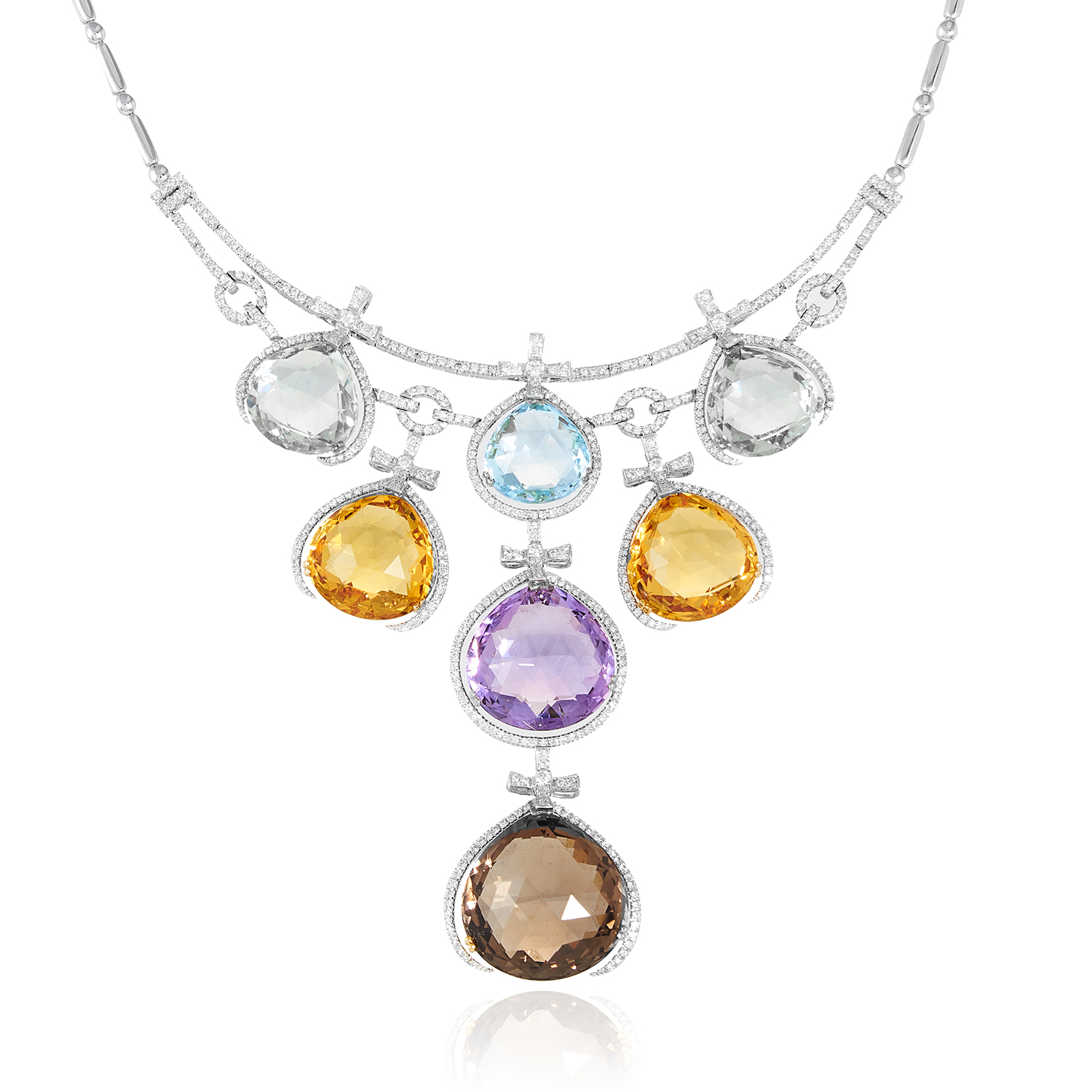 A FANCY COLOUR QUARTZ AND DIAMOND NECKLACE in 18ct white gold, designed as a fringe of graduated