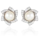 A PAIR OF PEARL AND DIAMOND EARRINGS in white gold or platinum, each set with a pearl of