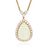 AN OPAL AND DIAMOND PENDANT NECKLACE in 18ct yellow gold, the large pear shaped cabochon encircled