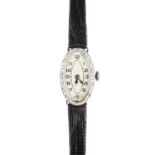 AN ANTIQUE ART DECO DIAMOND COCKTAIL WATCH, CIRCA 1920 in platinum, the oval face encircled with