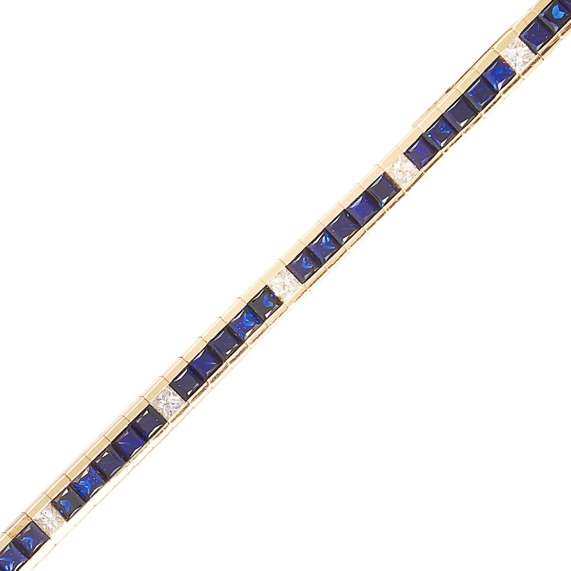 A SAPPHIRE AND DIAMOND LINE BRACELET in 18ct yellow gold, comprising ten rows of five princess cut - Bild 2 aus 2