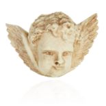 AN ANTIQUE CARVED IVORY CHERUB BROOCH, 19TH CENTURY carved in detail to depict a winged cherub, 6.