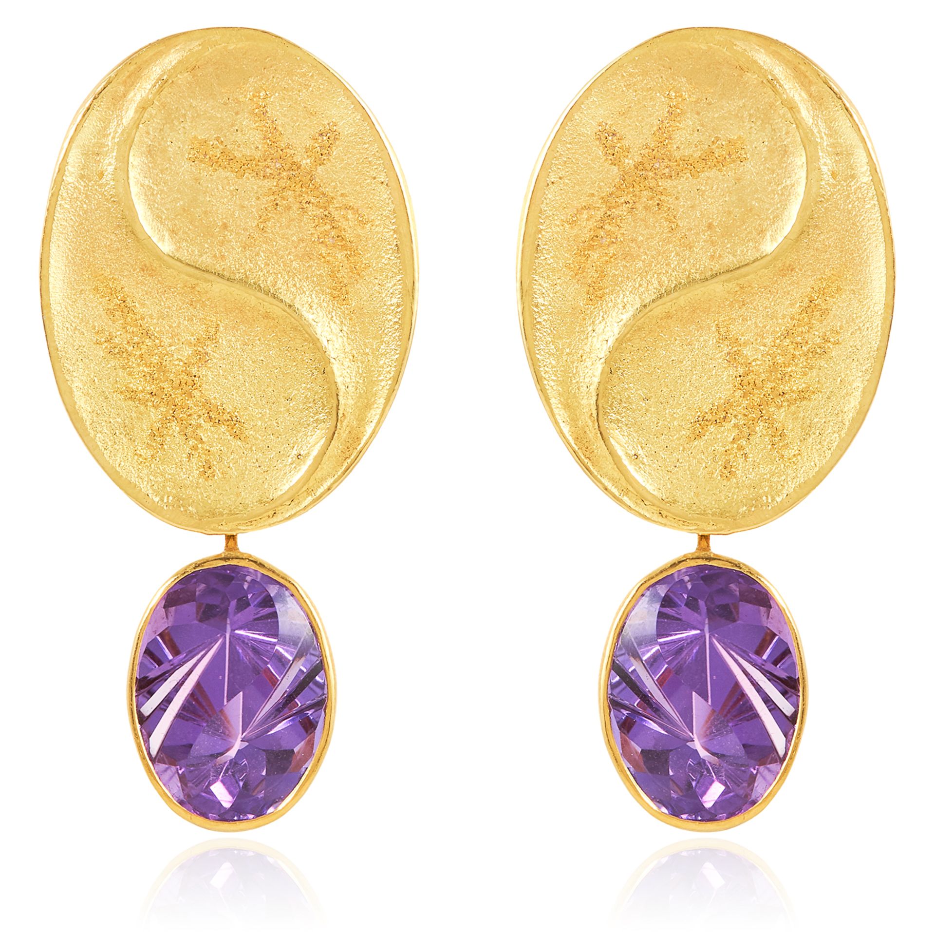 A PAIR OF AMETHYST EARRINGS, ZOBEL in 18ct yellow gold, each designed as a large 'yin/yang' motif,