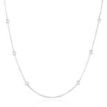 A 0.85 CARAT DIAMOND CHAIN NECKLACE in 18ct white gold, set with ten round cut diamonds totalling