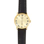 A LADIES WRISTWATCH, UNIVERSAL with gold dial and black leather strap, 23cm, 19.41g.