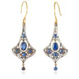 A PAIR OF SAPPHIRE AND DIAMOND EARRINGS in gold and silver, the tapering bodies set with sapphires